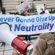 Proponents of net neutrality protest against Federal Communication Commission Chairman Ajit Pai outside the American Enterprise Institute. (Chip Somodevilla/Getty Images)